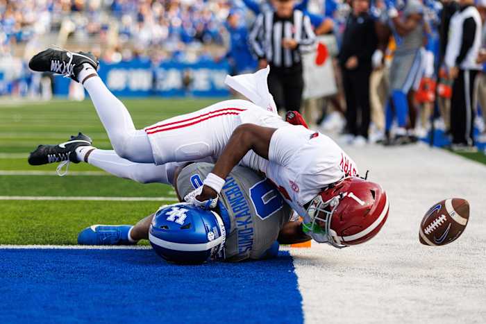 Nov 11, 2023; Lexington, Kentucky, USA; Alabama Crimson Tide defensive back Kool-Aid McKinstry (1) tackles Kentucky Wildcats running back Demie Sumo-Karngbaye (0) during the third quarter at Kroger Field.